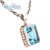 Sterling Silver Dot Pendant with One Extra Large Emerald Cut Blue Topa